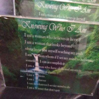 Inspiring And Motivating Words On A Transparent Plaque