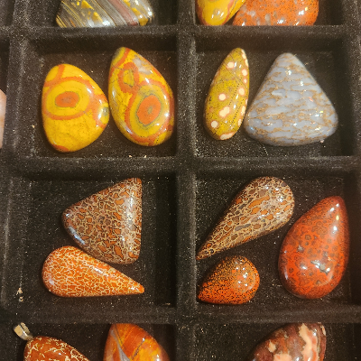 Various Rock Slabs And Polished Rocks Made Into Magnets, Necklaces, Earrings