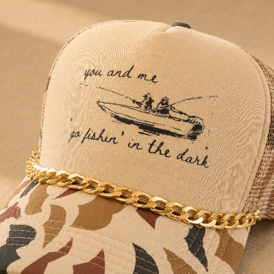 The Fishing In The Dark Trucker Hat