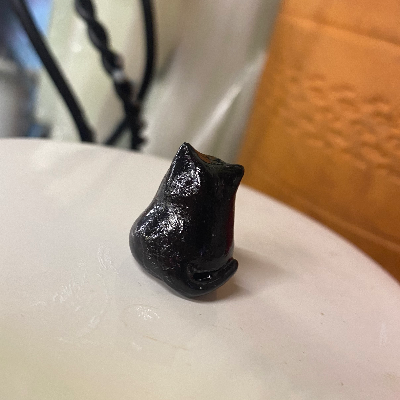 Miniature Black Cat