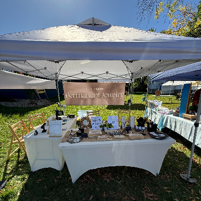 Tent Set Up, Table, And Signage