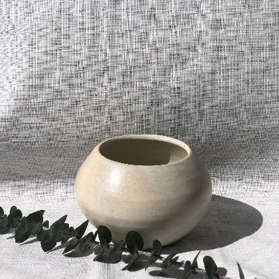 Round Ceramics Vase With An Iridescent White Finish