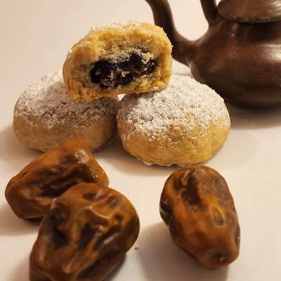 Kahk ( Egyptian Cookies Stuffed With Dates Or Walnuts, Honey And Sesame Seeds)